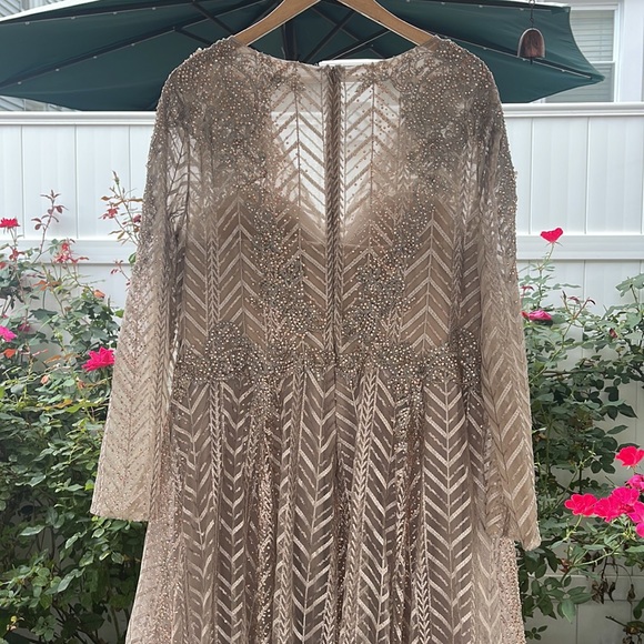 Ieena Mac Duggal - Embellished Illusion Long Sleeve Taupe A-line Gown - Picture 9 of 17